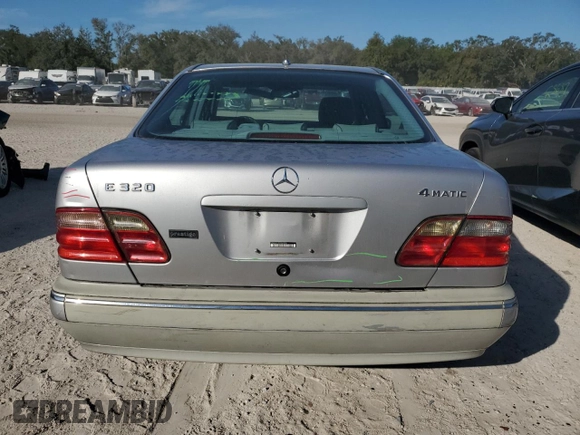 2002 Mercedes-Benz E-Class with VIN WDBJF82J92X067535, listed as a Copart auction lot 82759874 with 193,765 mi miles and Salvage Title. Bid and sale history available at carsss.com. Image 6.