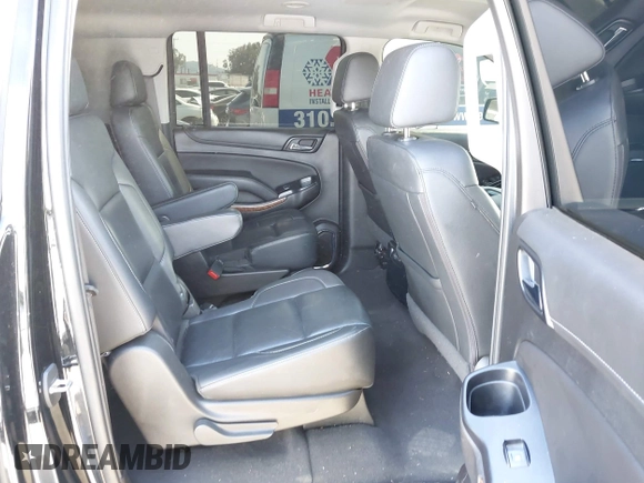 2019 Chevrolet Suburban LT with VIN 1GNSCJKCXKR332739, listed as a IAAI auction lot 41636530 with 104,997 mi miles and . Bid and sale history available at DreamBid. Image 8.