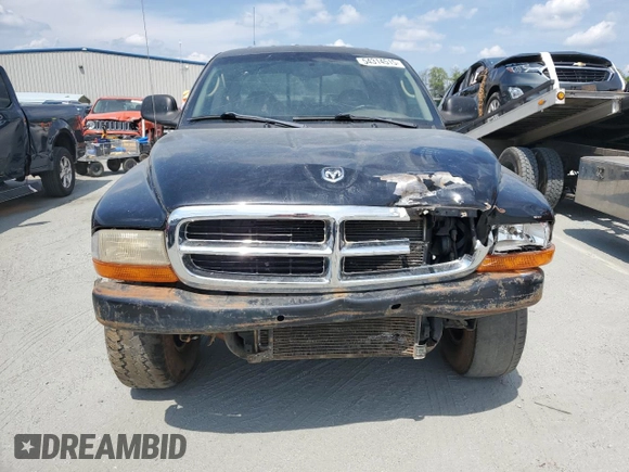 2003 Dodge Dakota z VIN 1D7HG38Z13S220152, wystawiony jako Copart lot #54314515 z przebiegiem Nie podano mil oraz Szkoda całkowita • Salvage title. Historia ofert i sprzedaży dostępna na DreamBid. Obrazek 5.