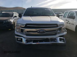 2019 Ford F-150 XL with VIN 1FTEW1E51KKE18332, listed as a Copart auction lot 86268344 with 141,566 mi miles and Salvage Title. Bid and sale history available at carsss.com. Image 5.