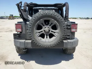2015 Jeep Wrangler Sport with VIN 1C4GJWAG8FL563198, listed as a Copart auction lot 52867385 with 47,854 mi miles and Salvage title. Bid and sale history available at DreamBid. Image 6.