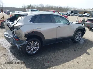 2022 Mazda CX-30 S Select with VIN 3MVDMBBL4NM401563, listed as a IAAI auction lot 41826878 with 4,733 mi miles and . Bid and sale history available at carsss.com. Image 13.