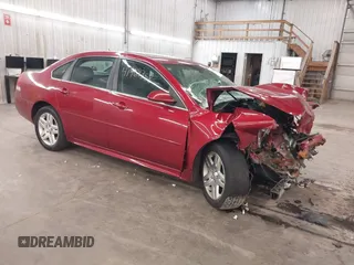 2014 Chevrolet Impala LT with VIN 2G1WB5E36E1133855, listed as a IAAI auction lot 41969358 with 148,897 mi miles and . Bid and sale history available at DreamBid. Image 1.