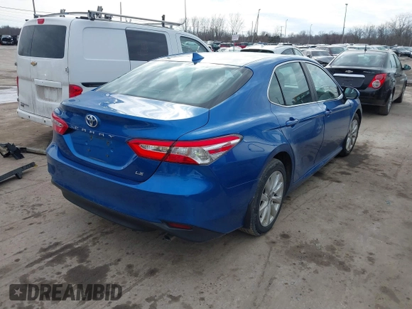 2020 Toyota Camry LE with VIN 4T1C11AKXLU401967, listed as a IAAI auction lot 41619121 with 94,962 mi miles. Bid and sale history available at carsss.com. Image 4.