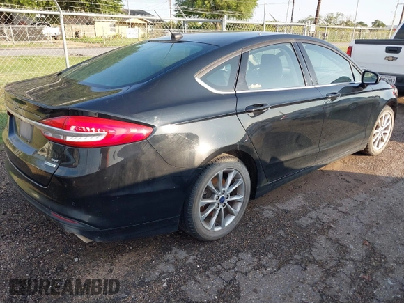 2017 Ford Fusion SE z VIN 3FA6P0HD4HR179674, wystawiony jako IAAI lot #42221747 z przebiegiem Nie podano mil oraz . Historia ofert i sprzedaży dostępna na DreamBid. Obrazek 4.
