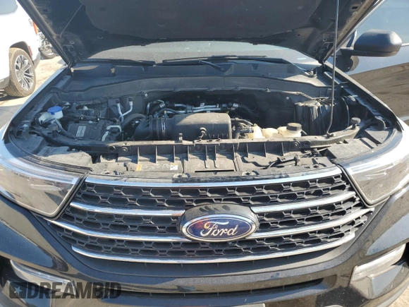 2023 Ford Explorer XLT with VIN 1FMSK8DH7PGB08372, listed as a Copart auction lot 62395205 with 63,257 mi miles and Salvage title. Bid and sale history available at DreamBid. Image 11.
