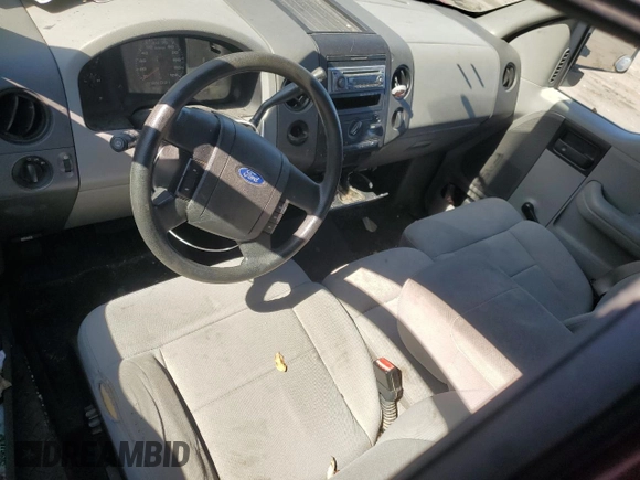 2005 Ford F-150 XL with VIN 1FTRF12W65KC58208, listed as a Copart auction lot 82281114 with 129,774 mi miles and Salvage title. Bid and sale history available at DreamBid. Image 8.