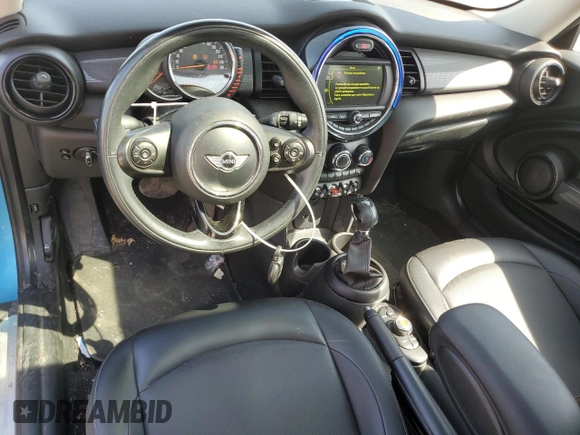 2017 MINI Hardtop Cooper with VIN WMWXP5C33H2G60921, listed as a Copart auction lot 58139295 with 94,599 mi miles and Salvage title. Bid and sale history available at DreamBid. Image 8.