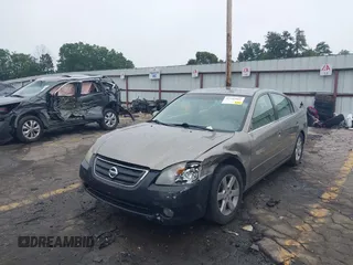 2002 Nissan Altima SL z VIN 1N4AL11D92C294136, wystawiony jako IAAI lot #42342860 z przebiegiem 220 080 mil mil oraz . Historia ofert i sprzedaży dostępna na DreamBid. Obrazek 2.