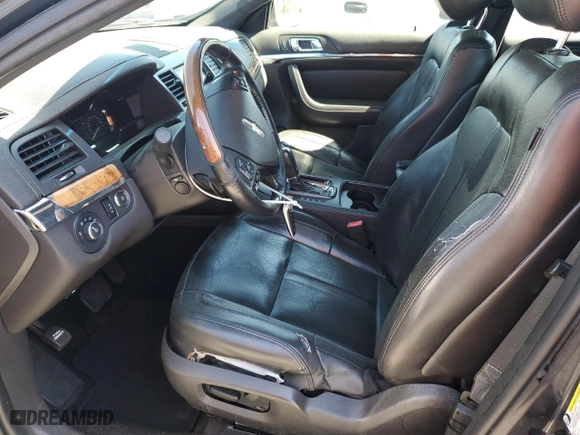 2013 Lincoln MKS with VIN 1LNHL9DK8DG617570, listed as a Copart auction lot 49063985 with 327,205 mi miles and Salvage Title. Bid and sale history available at carsss.com. Image 7.