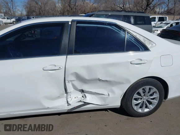 2015 Toyota Camry XLE with VIN 4T4BF1FK7FR465495, listed as a IAAI auction lot 41684622 with 126,543 mi miles and . Bid and sale history available at carsss.com. Image 5.