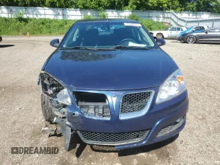 2009 Pontiac G6 1SB with VIN 1G2ZJ57K694272894, listed as a Copart auction lot 63006935 with 125,640 mi miles and Clean title. Bid and sale history available at DreamBid. Image 5.