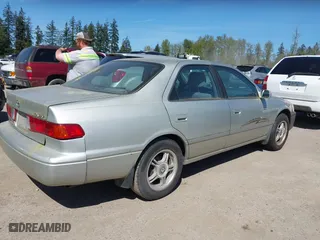 2000 Toyota Camry CE with VIN JT2BG22K6Y0451632, listed as a IAAI auction lot 42030842 with 200,734 mi miles. Bid and sale history available at carsss.com. Image 4.