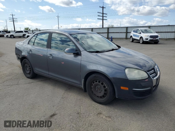 2009 Volkswagen Jetta S with VIN 3VWJM71K59M007776, listed as a Copart auction lot 53959525 with 190,557 mi miles and Salvage title. Bid and sale history available at DreamBid. Image 4.