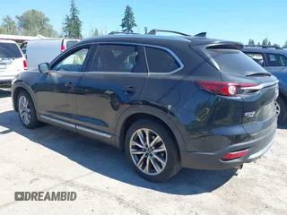 2018 Mazda CX-9 Grand Touring z VIN JM3TCBDY2J0237050, wystawiony jako IAAI lot #42457060 z przebiegiem 130 625 mil mil oraz . Historia ofert i sprzedaży dostępna na DreamBid. Obrazek 3.