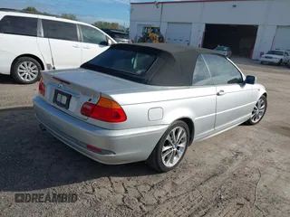 2004 BMW 3 Series 330Ci with VIN WBABW534X4PL45274, listed as a IAAI auction lot 41437124 with 124,001 mi miles. Bid and sale history available at carsss.com. Image 4.