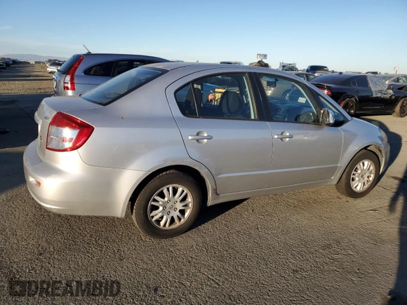 2012 Suzuki SX4 LE with VIN JS2YC5A33C6301529, listed as a Copart auction lot 79363394 with 72,348 mi miles and Clean Title. Bid and sale history available at carsss.com. Image 3.