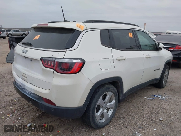 2019 Jeep Compass Latitude z VIN 3C4NJCBBXKT802046, wystawiony jako IAAI lot #41359411 z przebiegiem 82 747 mil mil oraz . Historia ofert i sprzedaży dostępna na DreamBid. Obrazek 4.