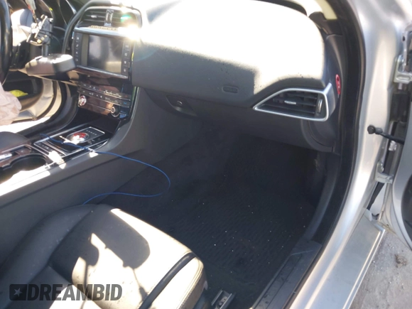 2017 Jaguar XE 25t Premium with VIN SAJAD4BG8HA976156, listed as a IAAI auction lot 41496861 with 83,824 mi miles. Bid and sale history available at carsss.com. Image 5.