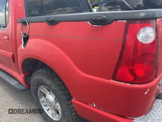 2004 Ford Explorer Sport Trac XLS z VIN 1FMZU67KX4UC40253, wystawiony jako IAAI lot #42894779 z przebiegiem 165 814 mil mil oraz . Historia ofert i sprzedaży dostępna na DreamBid. Obrazek 26.