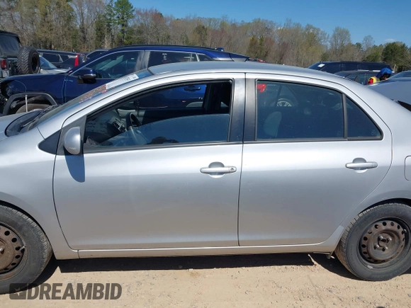 2010 Toyota Yaris with VIN JTDBT4K35A1359371, listed as a IAAI auction lot 41870593 with 207,616 mi miles. Bid and sale history available at carsss.com. Image 14.
