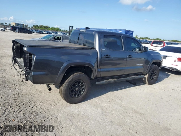 2020 Toyota Tacoma SR5 with VIN 3TMAZ5CN9LM125157, listed as a Copart auction lot 57178885 with 59,830 mi miles and Salvage title. Bid and sale history available at DreamBid. Image 3.