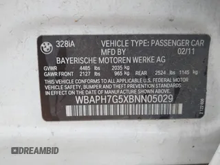 2011 BMW 3 Series 328i with VIN WBAPH7G5XBNN05029, listed as a IAAI auction lot 41955493 with 1 mi miles. Bid and sale history available at carsss.com. Image 9.