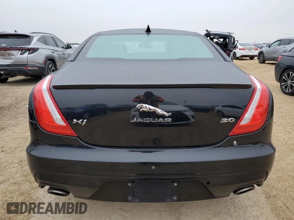2017 Jaguar XJ R-Sport with VIN SAJWA1C77H8W04956, listed as a Copart auction lot 45174505 with 142,002 mi miles and Salvage title. Bid and sale history available at DreamBid. Image 6.