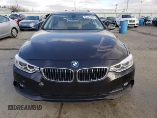 2015 BMW 4 Series 428i xDrive with VIN WBA4C9C57FG135476, listed as a Copart auction lot 82427893 with 76,405 mi miles and . Bid and sale history available at DreamBid. Image 5.