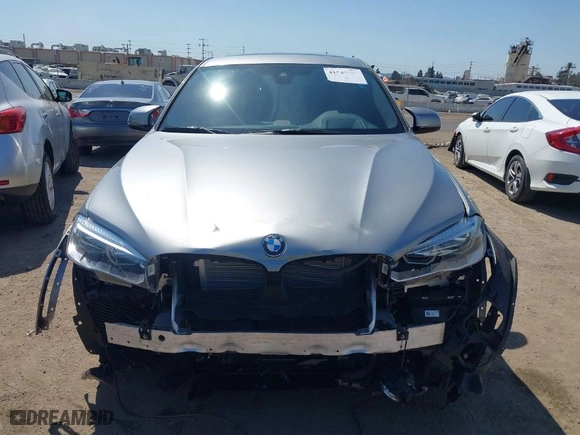 2019 BMW X6 M with VIN 5YMKW8C5XK0Y74895, listed as a IAAI auction lot 41847396 with NaN miles. Bid and sale history available at carsss.com. Image 13.