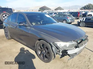 2014 BMW 3 Series 328i with VIN WBA3A5C56EP603819, listed as a IAAI auction lot 41217764 with 156,140 mi miles. Bid and sale history available at carsss.com. Image 1.