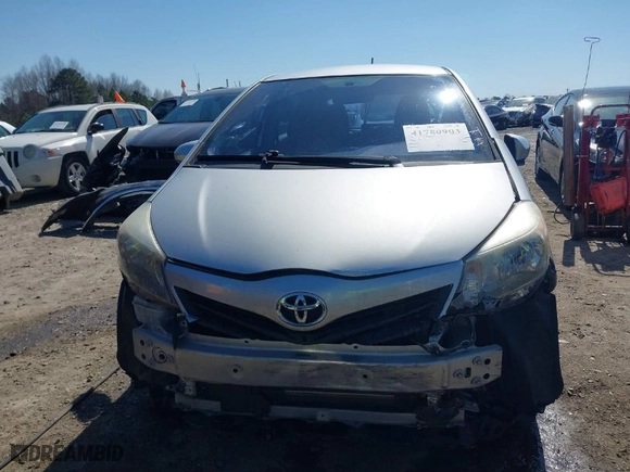 2014 Toyota Yaris L with VIN JTDKTUD32ED593419, listed as a IAAI auction lot 41780903 with 81,609 mi miles. Bid and sale history available at carsss.com. Image 6.