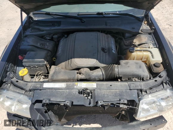2009 Chrysler 300 with VIN 2C3KA63T39H580730, listed as a Copart auction lot 64933564 with 155,403 mi miles and Salvage Title. Bid and sale history available at carsss.com. Image 11.