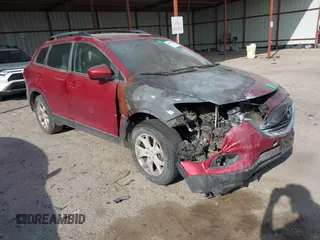 2015 Mazda CX-9 Touring with VIN JM3TB2CA9F0448745, listed as a IAAI auction lot 41859771 with Not Provided miles and . Bid and sale history available at DreamBid. Image 1.