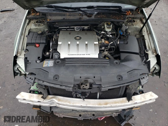 2006 Cadillac DTS 1SC z VIN 1G6KD57Y26U182388, wystawiony jako Copart lot #71929184 z przebiegiem 91 711 mil mil oraz Szkoda całkowita • Salvage title. Historia ofert i sprzedaży dostępna na DreamBid. Obrazek 11.