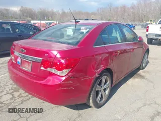 2014 Chevrolet Cruze 2LT z VIN 1G1PE5SB6E7450500, wystawiony jako IAAI lot #41977117 z przebiegiem 102 037 mil mil oraz . Historia ofert i sprzedaży dostępna na DreamBid. Obrazek 4.
