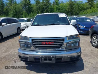 2012 GMC Canyon SLE1 z VIN 1GTJ6MFE0C8141833, wystawiony jako IAAI lot #42414039 z przebiegiem 144 110 mil mil oraz . Historia ofert i sprzedaży dostępna na DreamBid. Obrazek 12.