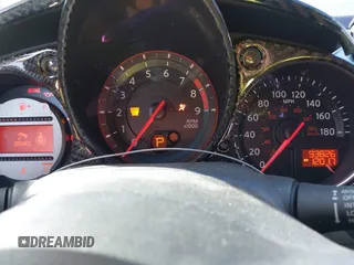 2009 Nissan 370Z Touring with VIN JN1AZ44E39M408668, listed as a IAAI auction lot 41231840 with 93,826 mi miles and . Bid and sale history available at DreamBid. Image 7.