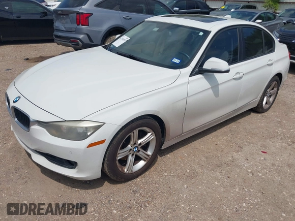 2013 BMW 3 Series 328i with VIN WBA3A5C5XDJ461783, listed as a IAAI auction lot 42150355 with 115,992 mi miles and . Bid and sale history available at DreamBid. Image 2.