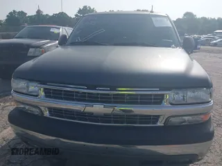 2002 Chevrolet Tahoe LS z VIN 1GNEC13ZX2R273935, wystawiony jako IAAI lot #42246472 z przebiegiem 205 995 mil mil oraz . Historia ofert i sprzedaży dostępna na DreamBid. Obrazek 6.