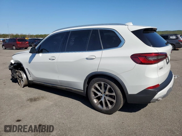 2020 BMW X5 xDrive40i with VIN 5UXCR6C09L9C13127, listed as a Copart auction lot 53941035 with 76,685 mi miles and Salvage title. Bid and sale history available at DreamBid. Image 2.
