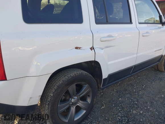 2015 Jeep Patriot High Altitude with VIN 1C4NJRFB1FD155335, listed as a IAAI auction lot 41501790 with 133,537 mi miles and . Bid and sale history available at carsss.com. Image 13.