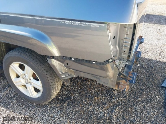 2013 Honda Ridgeline RTL with VIN 5FPYK1F55DB004842, listed as a IAAI auction lot 41843327 with 178,997 mi miles. Bid and sale history available at carsss.com. Image 20.