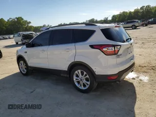 2018 Ford Escape SE with VIN 1FMCU0GD6JUA73082, listed as a Copart auction lot 50879005 with 148,900 mi miles and Salvage Title. Bid and sale history available at carsss.com. Image 2.