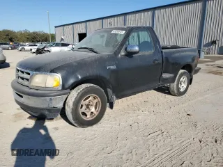 1997 Ford F-150 XL with VIN 1FTDF0725VKB37907, listed as a Copart auction lot 43856845 with 104,226 mi miles and Salvage title. Bid and sale history available at DreamBid. Image 1.