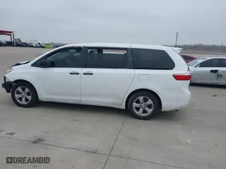 2015 Toyota Sienna L with VIN 5TDZK3DC5FS675095, listed as a IAAI auction lot 41434418 with 124,630 mi miles. Bid and sale history available at carsss.com. Image 14.