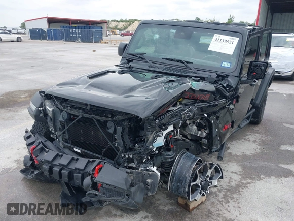 2021 Jeep Wrangler Unlimited Rubicon with VIN 1C4HJXFG7MW662092, listed as a IAAI auction lot 42139521 with 32,055 mi miles and . Bid and sale history available at DreamBid. Image 6.