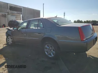2006 Cadillac DTS 1SC z VIN 1G6KD57Y76U237062, wystawiony jako Copart lot #70920534 z przebiegiem 84 589 mil mil oraz Szkoda całkowita • Salvage title. Historia ofert i sprzedaży dostępna na DreamBid. Obrazek 2.