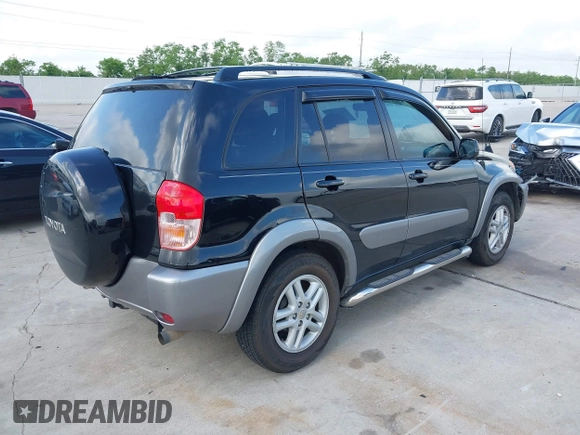 2001 Toyota RAV4 with VIN JTEGH20V910029962, listed as a IAAI auction lot 42092441 with 148,966 mi miles and . Bid and sale history available at DreamBid. Image 4.