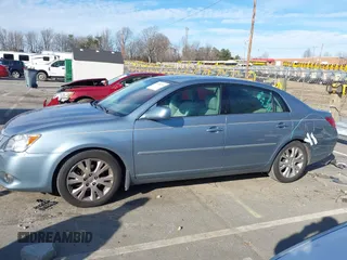 2009 Toyota Avalon XL with VIN 4T1BK36B19U350297, listed as a IAAI auction lot 41589714 with 141,003 mi miles. Bid and sale history available at carsss.com. Image 14.